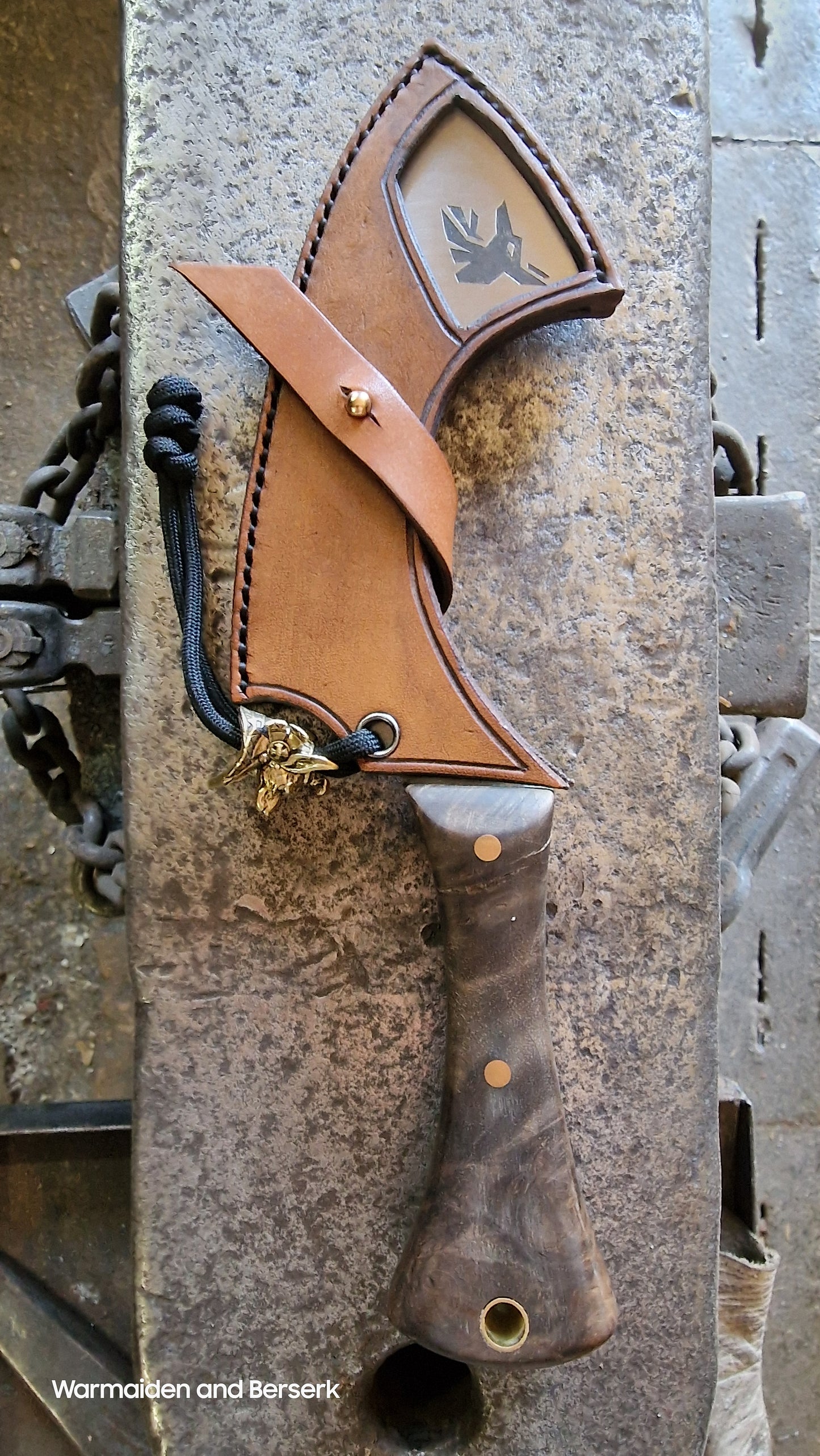 Hand-forged small knife in Chepesh form made of carbon steel with robust leather sheath