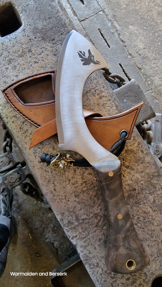 Hand-forged small knife in Chepesh form made of carbon steel with robust leather sheath