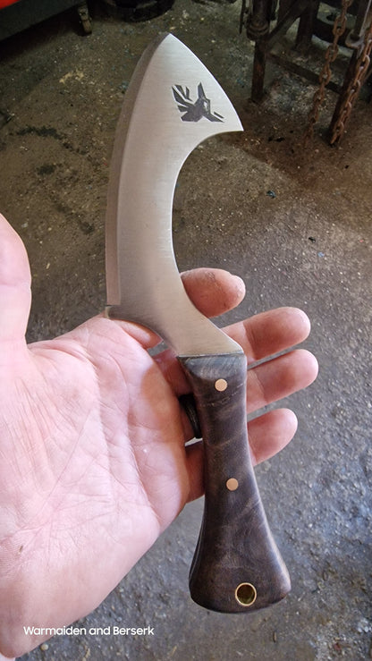 Hand-forged small knife in Chepesh form made of carbon steel with robust leather sheath